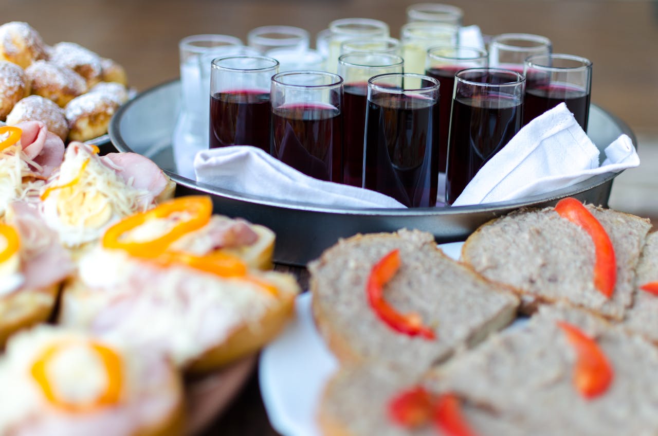 A beautifully arranged buffet with assorted foods and drinks, perfect for events or gatherings.